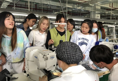 纺织与服装技术系师生赴企业参观学习